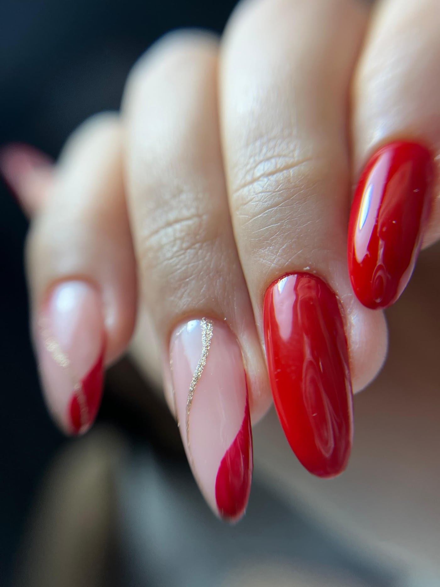 Cherry red almond gel nails with French accent
